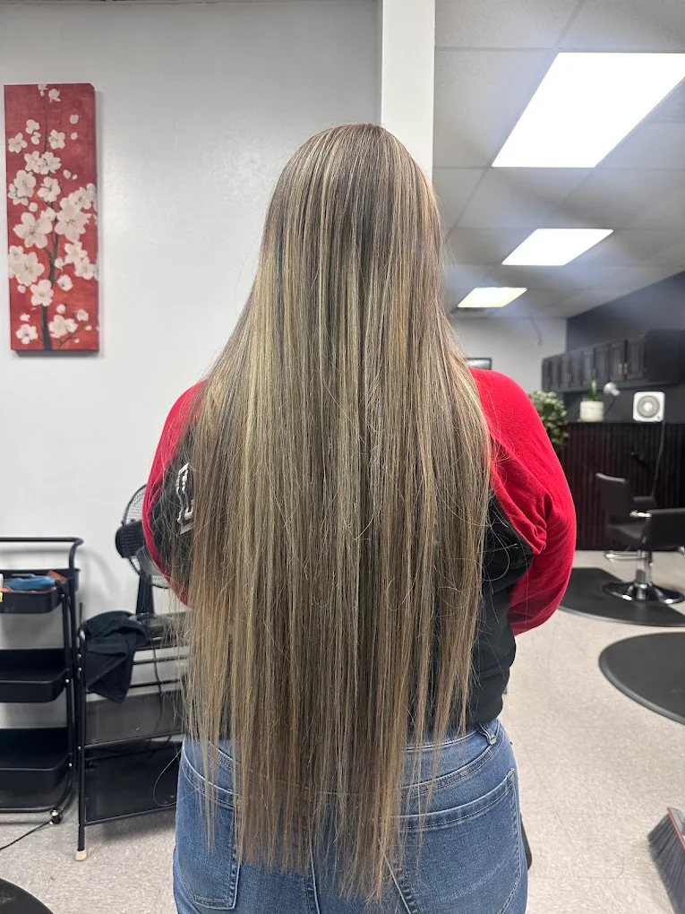 Long highlighted hair styled at Salon Express in Irving